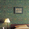 Blackthorn wallpaper in Green by Morris & Co