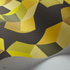Puzzle behang in Chartreuse on Charcoal van Cole & Son